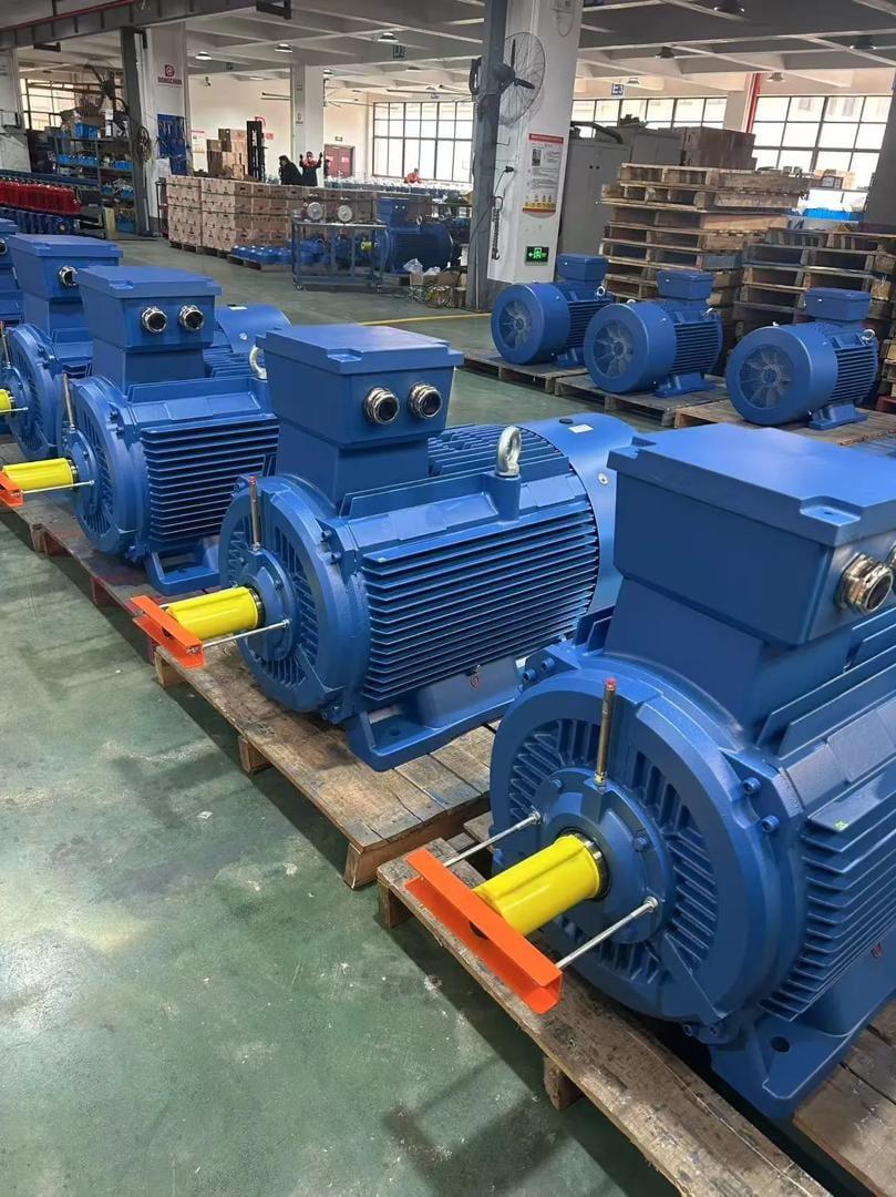 Row of large industrial electric motors prepared for dispatch